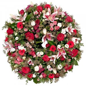 Stargazer lilies and Roses funeral wreath